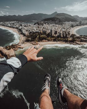 Daring aerial perspective of Copacabana with oceanfront cityscape and adventurous viewpoint.